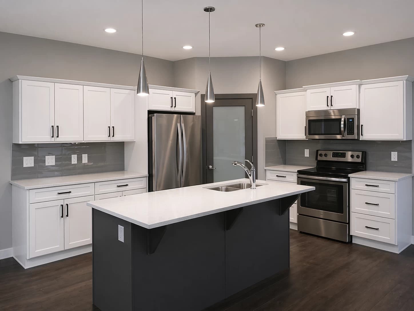 White shaker kitchen with dark island