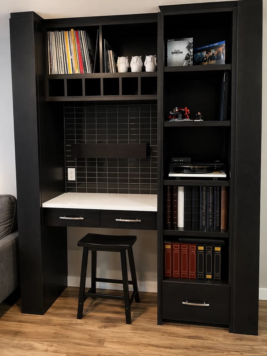 Black home office with records and display shelving