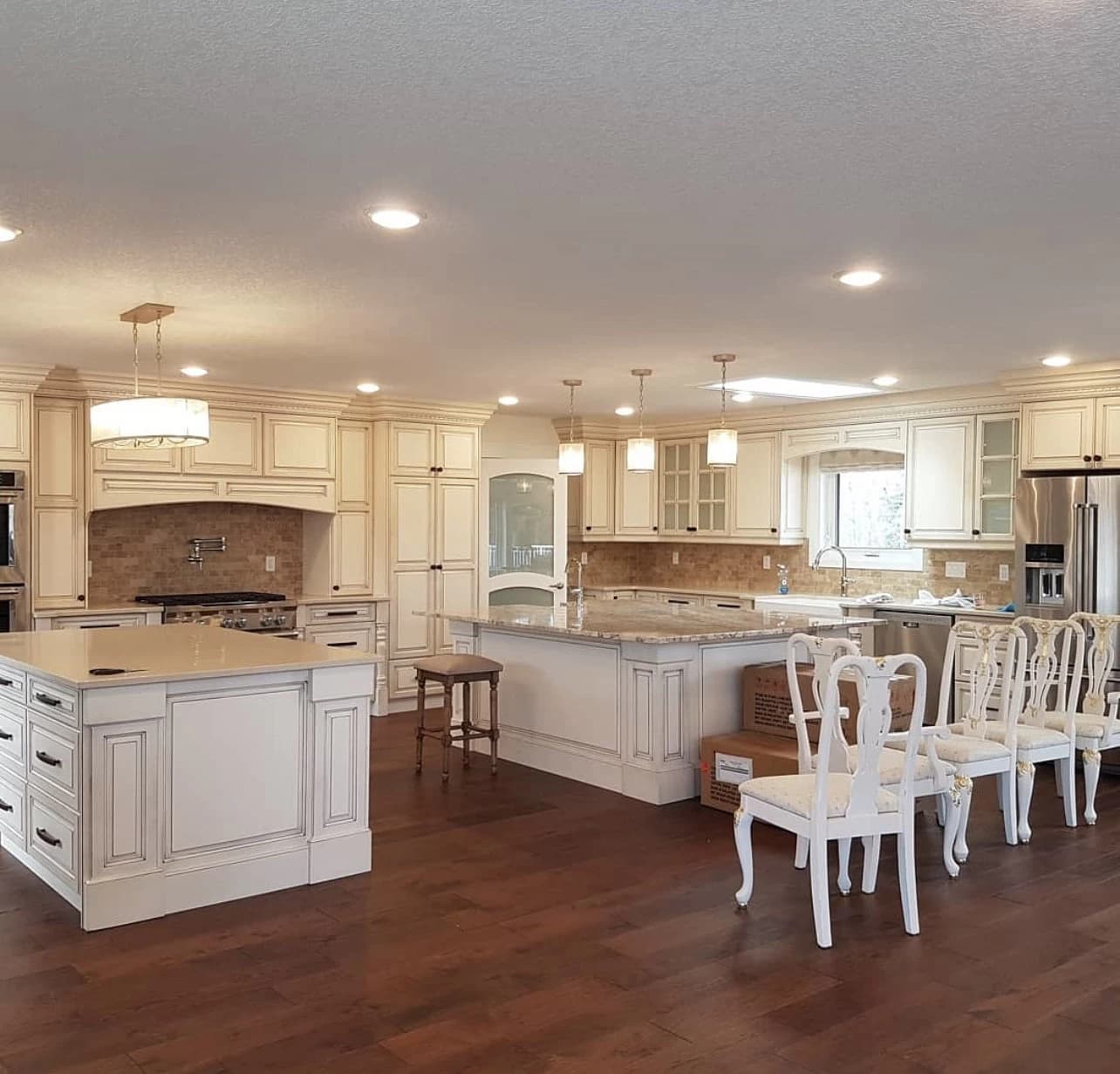 Traditional cream kitchen with two islands